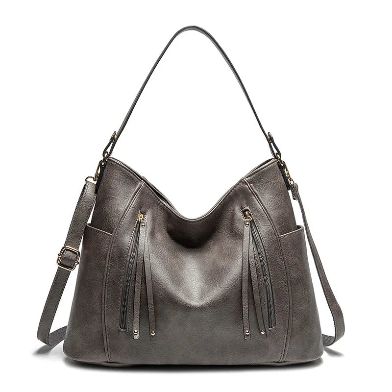 Wendy™ | Ledertasche mit Fransen